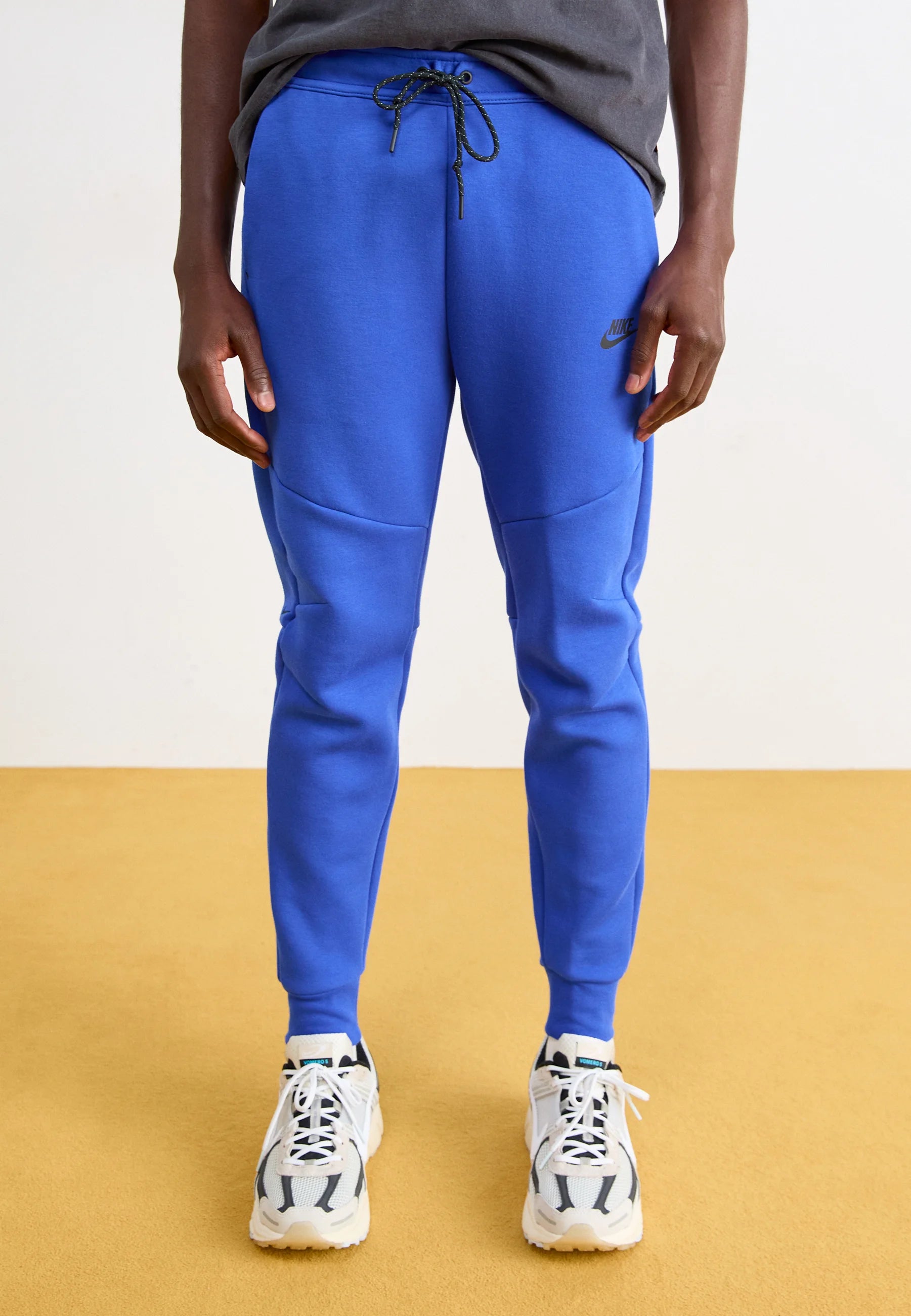Calça Nike Tech Fleece Windrunner