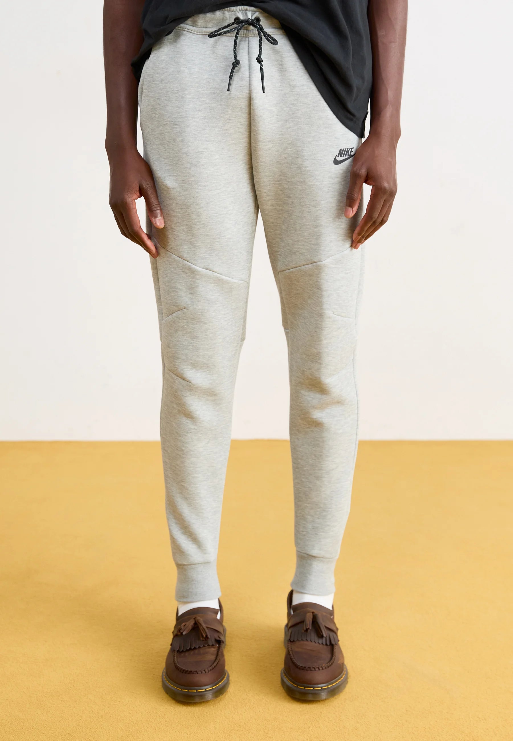 Calça Nike Tech Fleece Windrunner