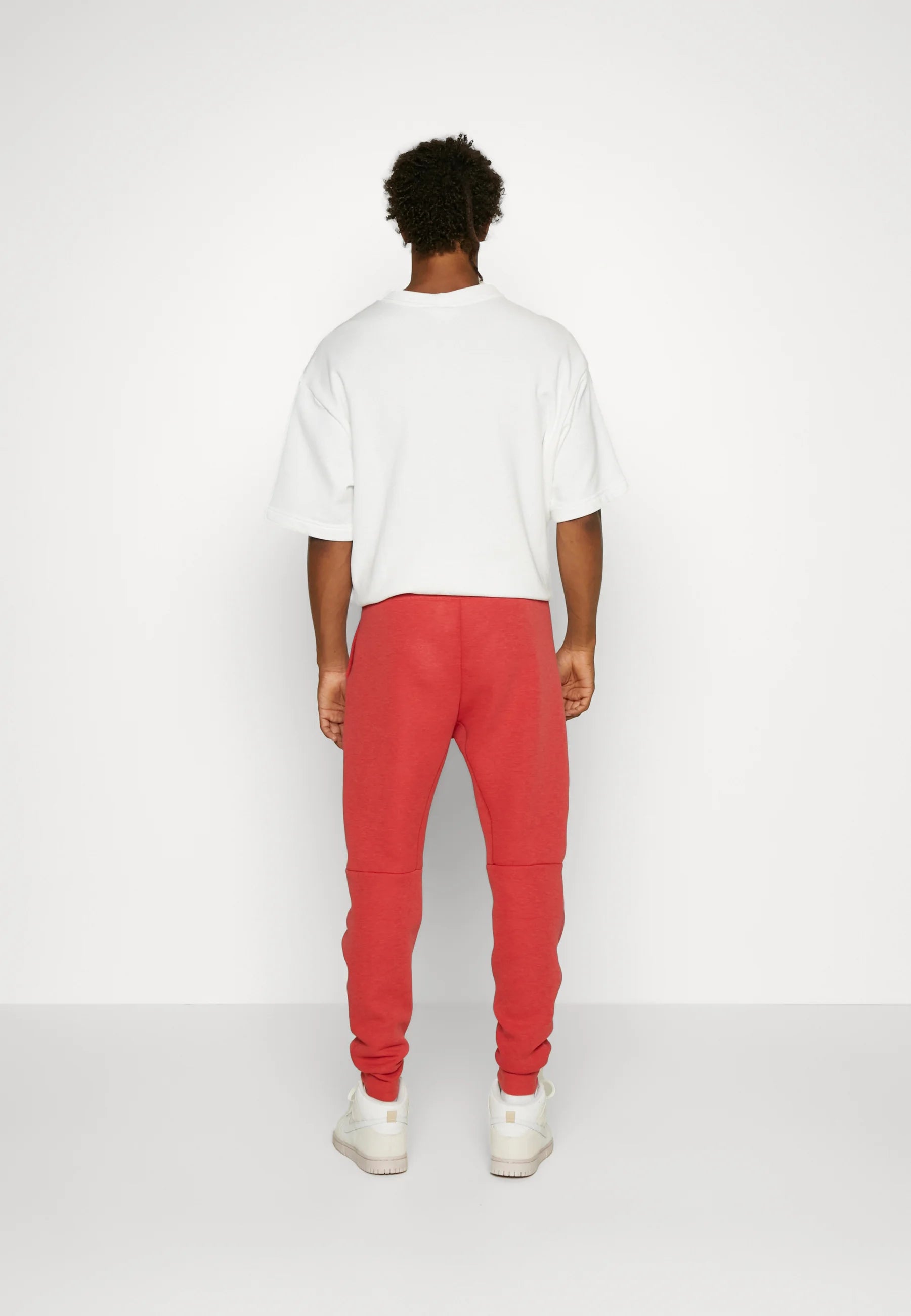 Calça Nike Tech Fleece Windrunner