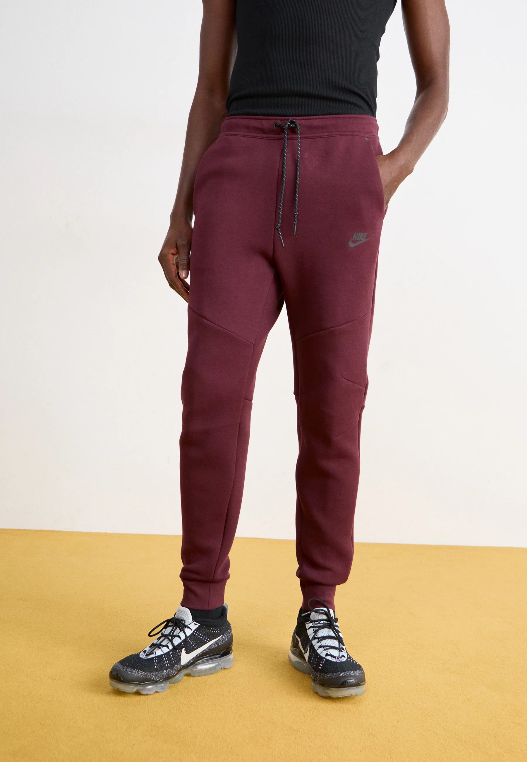 Calça Nike Tech Fleece Windrunner