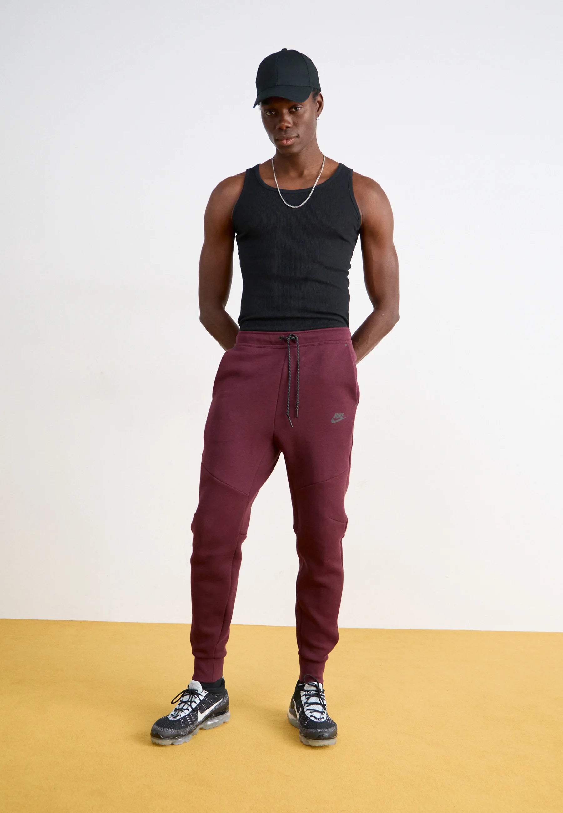 Calça Nike Tech Fleece Windrunner
