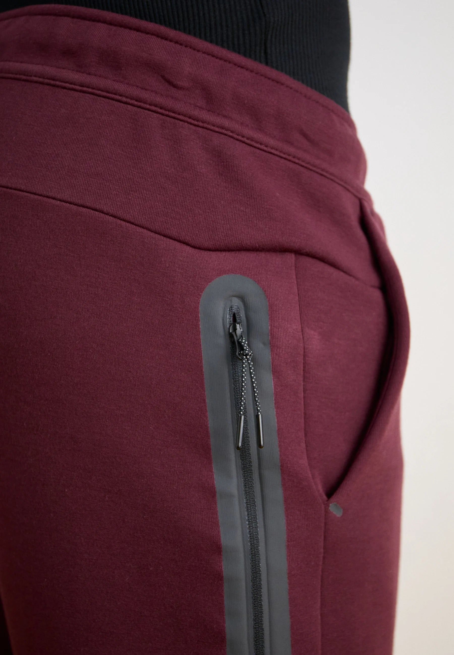 Calça Nike Tech Fleece Windrunner