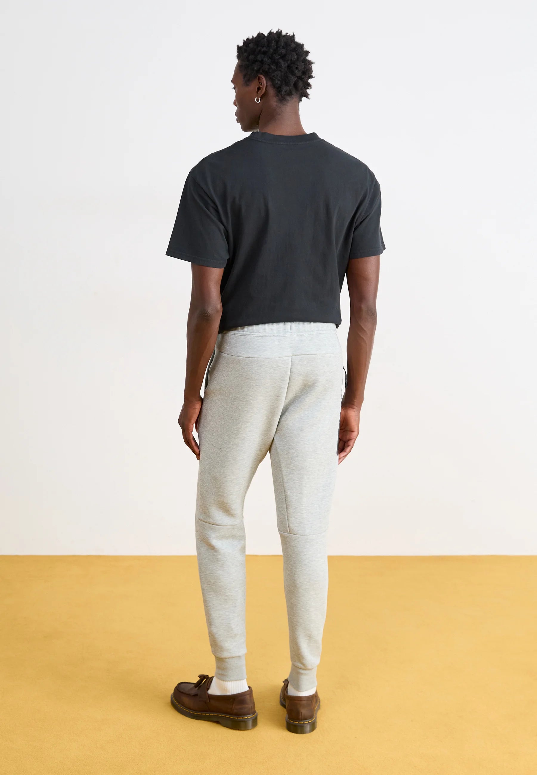 Calça Nike Tech Fleece Windrunner