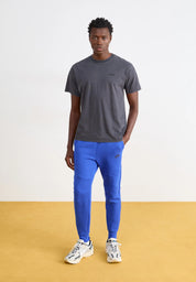 Calça Nike Tech Fleece Windrunner