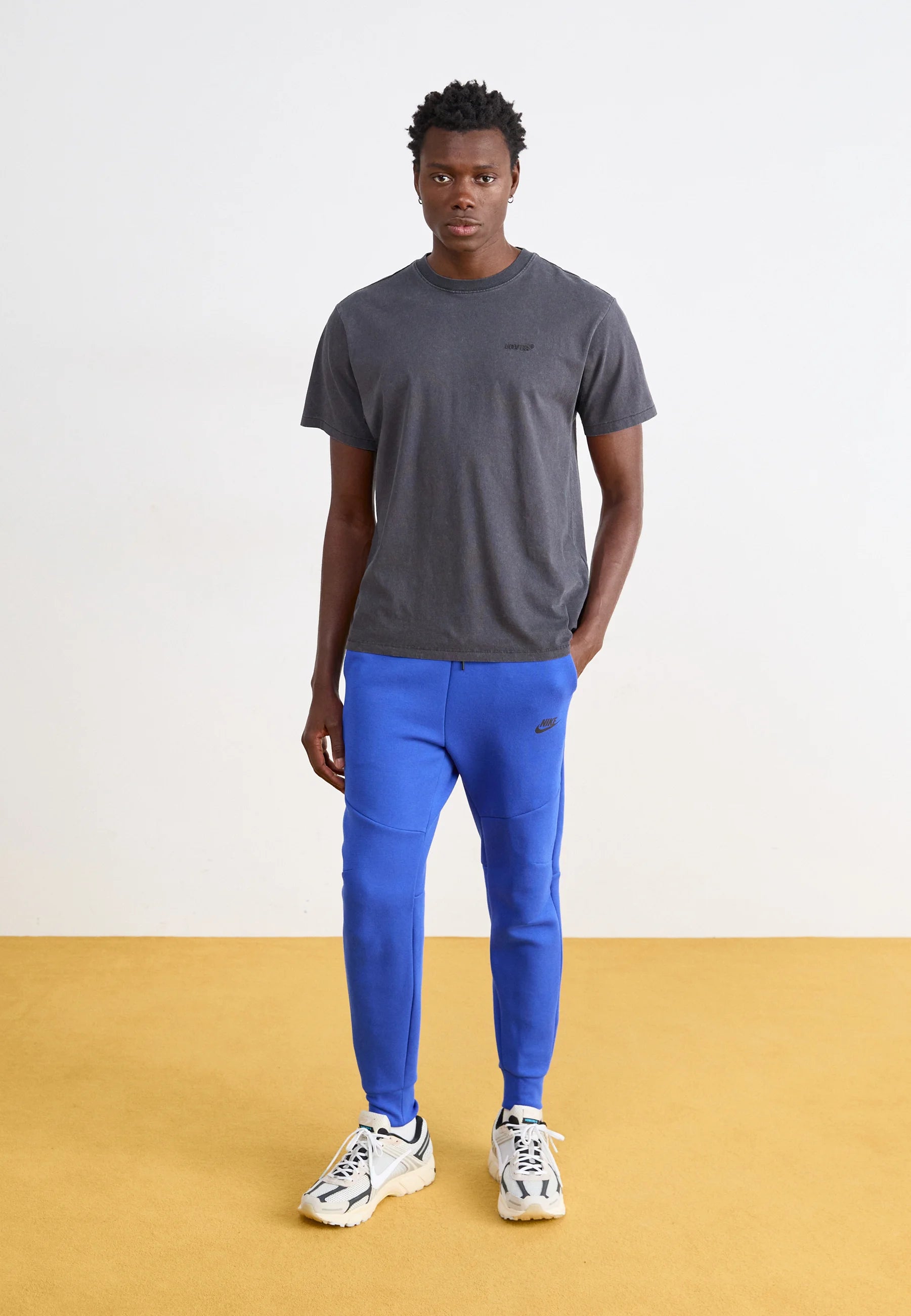 Calça Nike Tech Fleece Windrunner