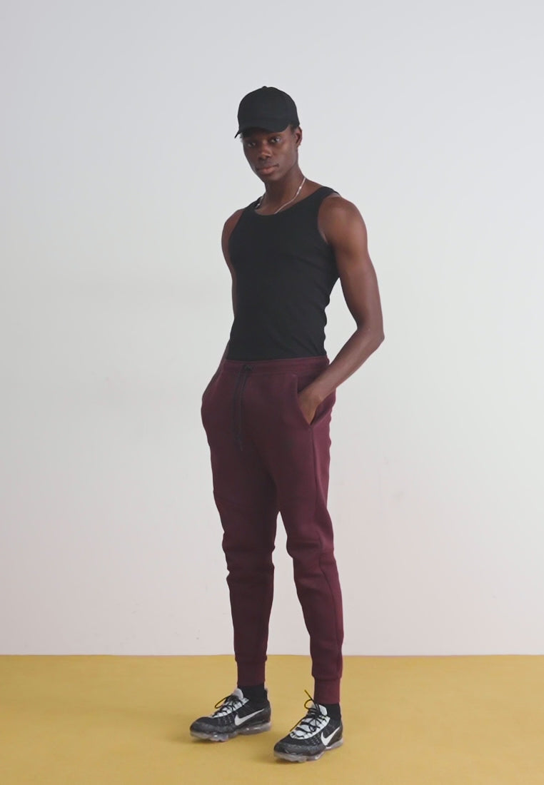 Calça Nike Tech Fleece Windrunner